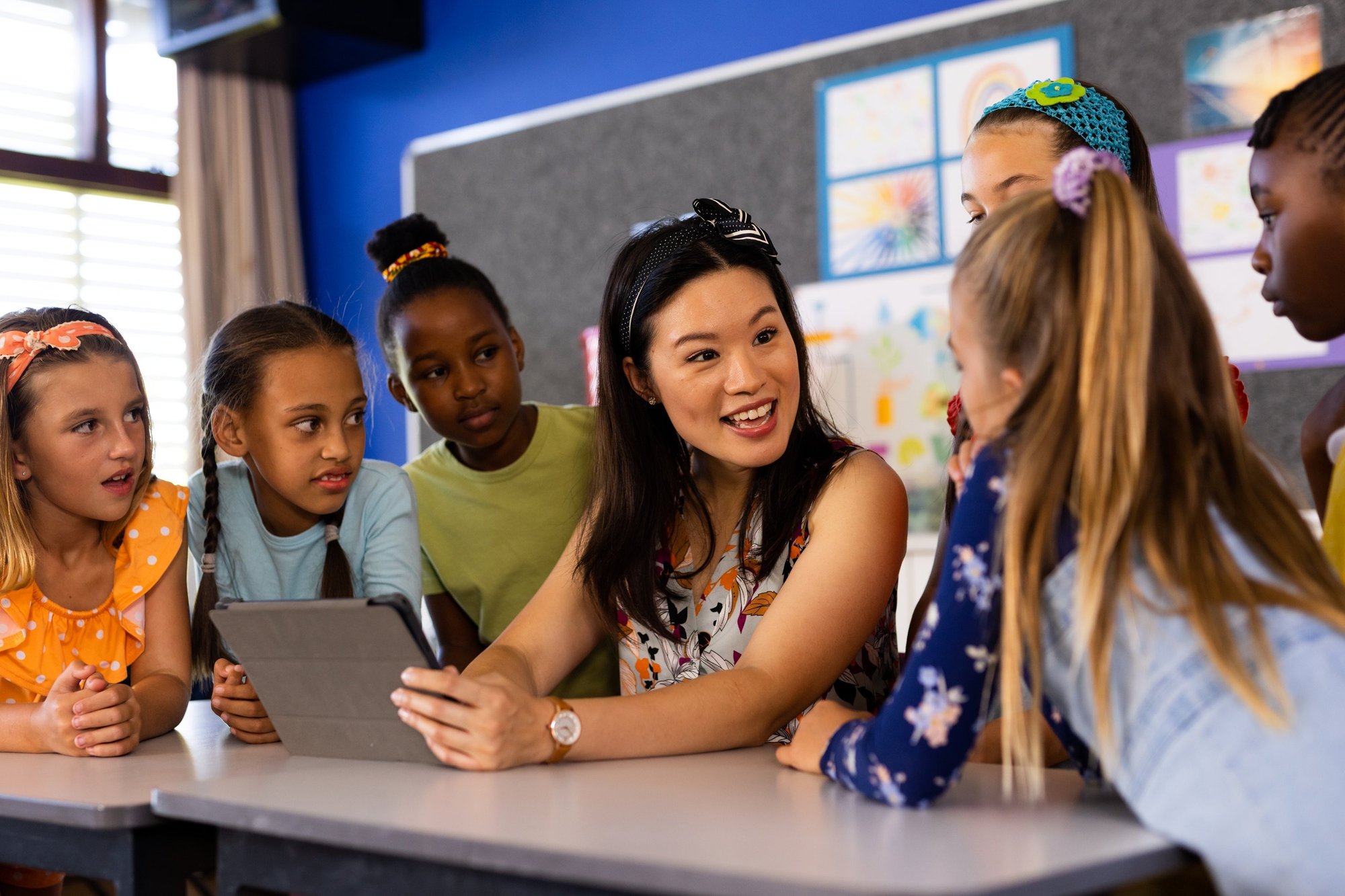 female-teacher-with-table