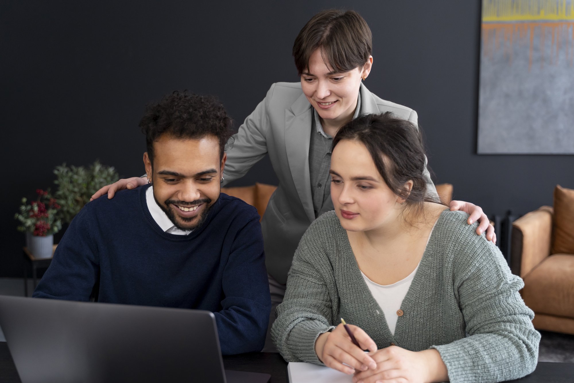 trans-person-working-office-with-colleagues